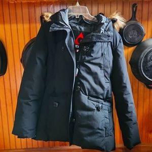 Winter coat with faux fur hood trim.